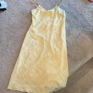 Yellow dress with white flowers, forever 2, size small.